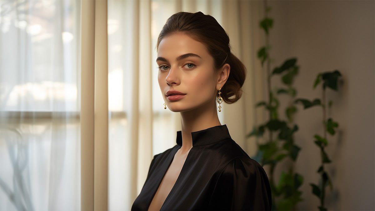 A contemporary image of a designer model wearing statement earrings.