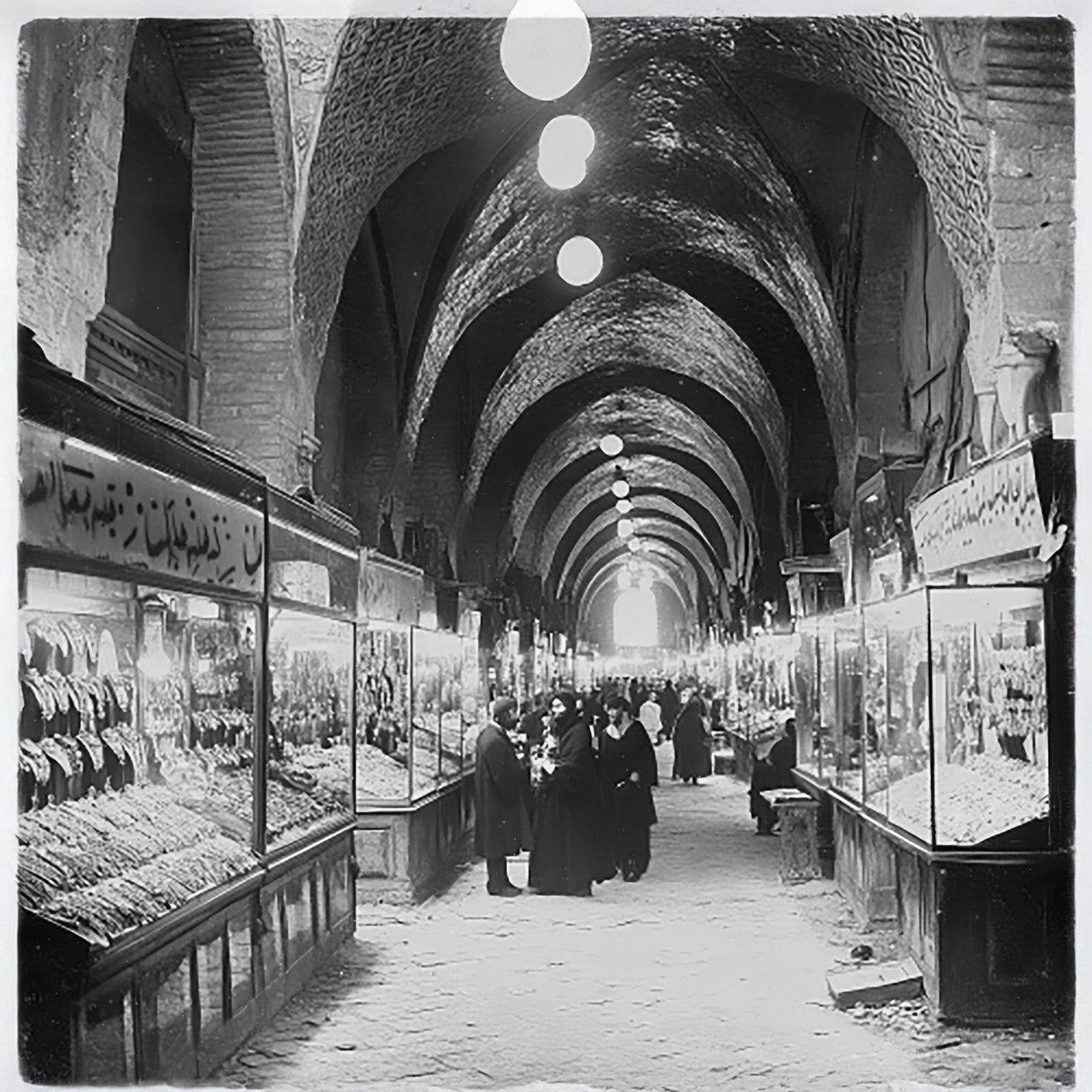 Restored 1950s photograph of a traditional merchant arcade, styled with a vintage aesthetic to reflect the history of the era.