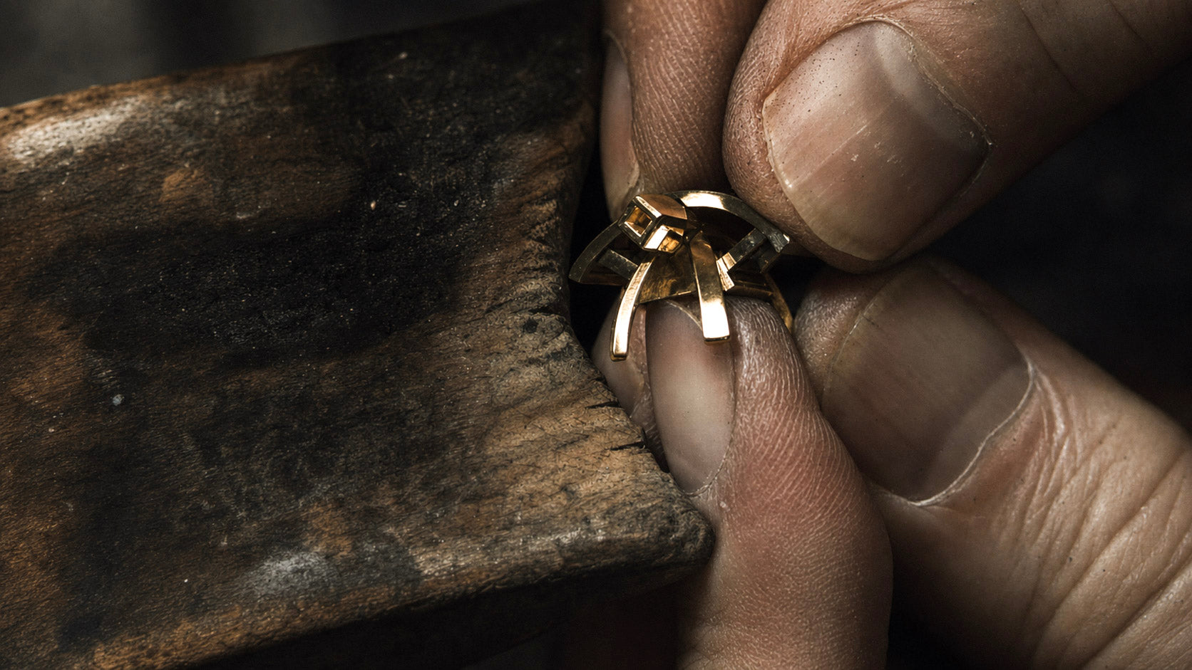 Master jeweler Garo Demirjian creating intricate designs at his jewelry bench.