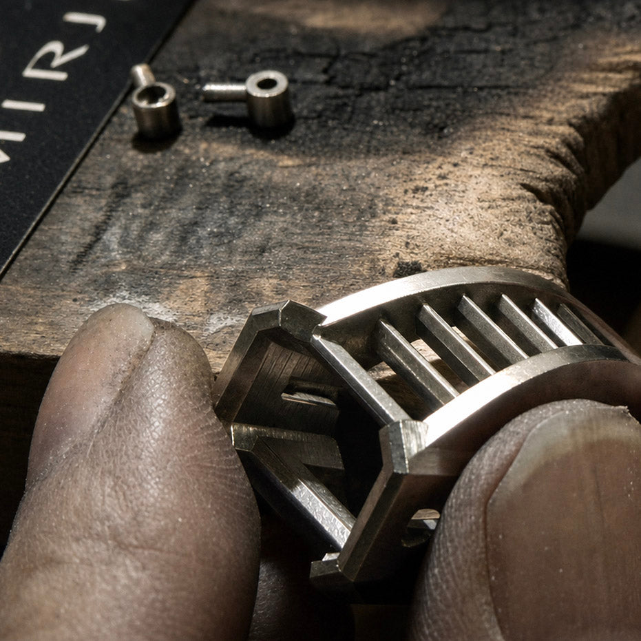 Close-up of custom ring being handcrafted at a Demirjian jewely bench during fabrication.